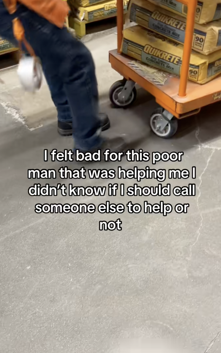 man trying to move a cart